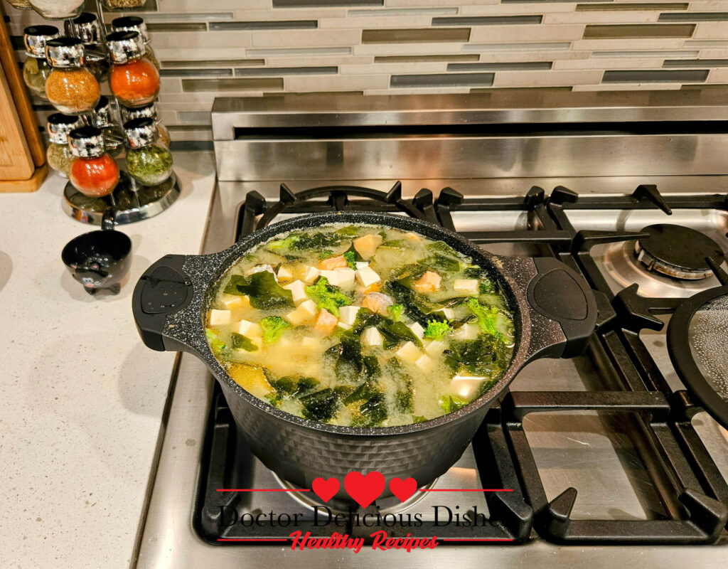 A perfectly cooked Salmon Tofu Miso Soup, ready to be served.