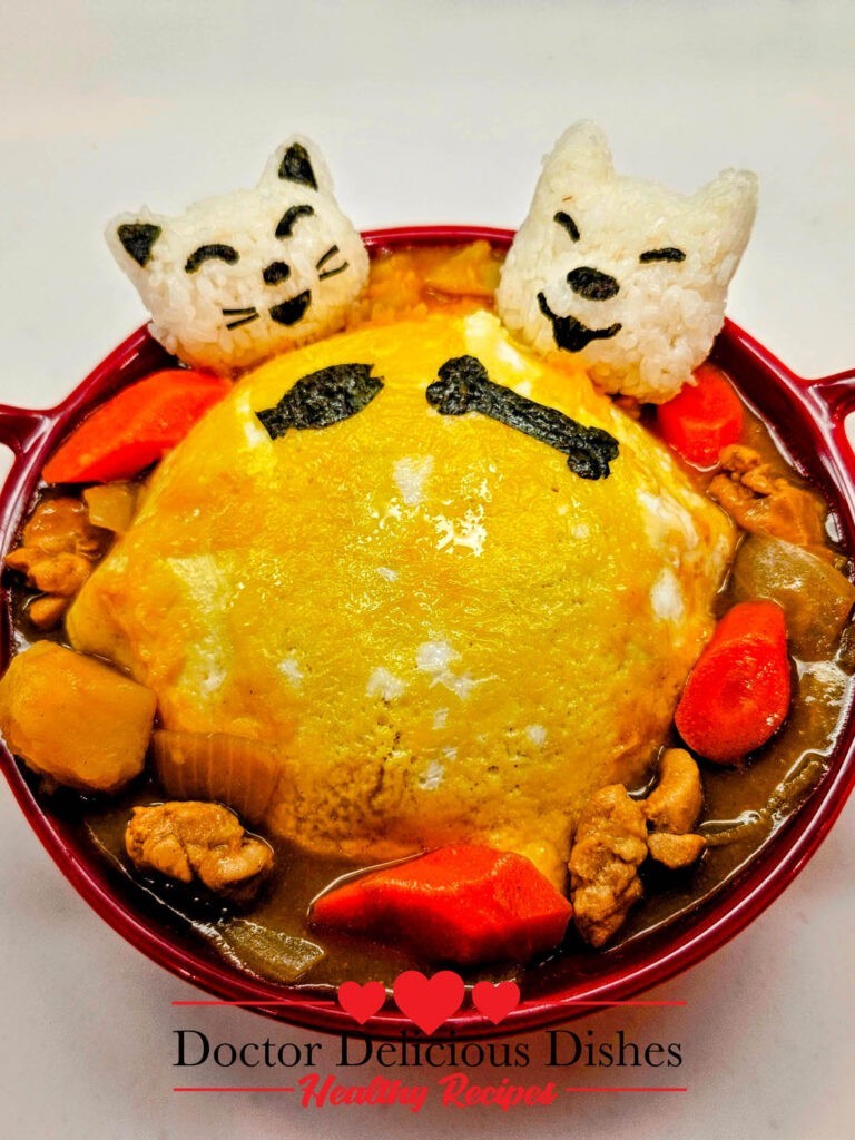 Chicken Curry with Potatoes, Carrots, and a Fluffy Egg Omelet pla