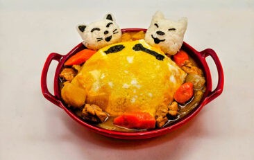 a bowl of food with cats faces