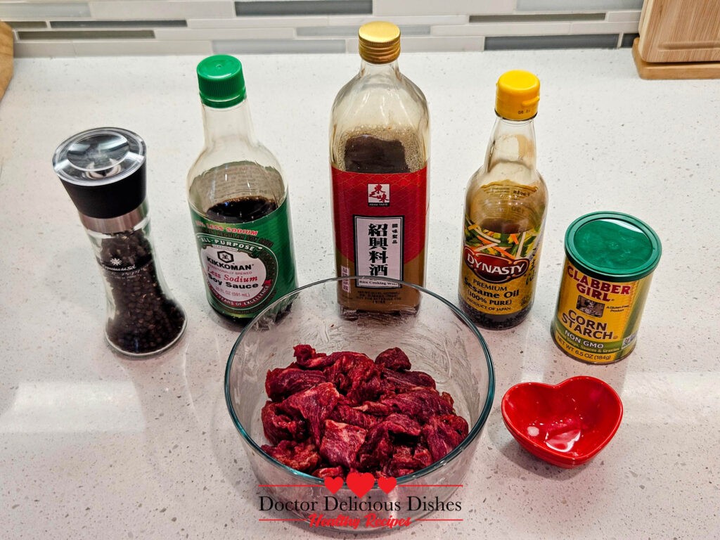 Beef slices marinated with soy sauce and sesame oil for Chinese Beef and Broccoli Recipe.