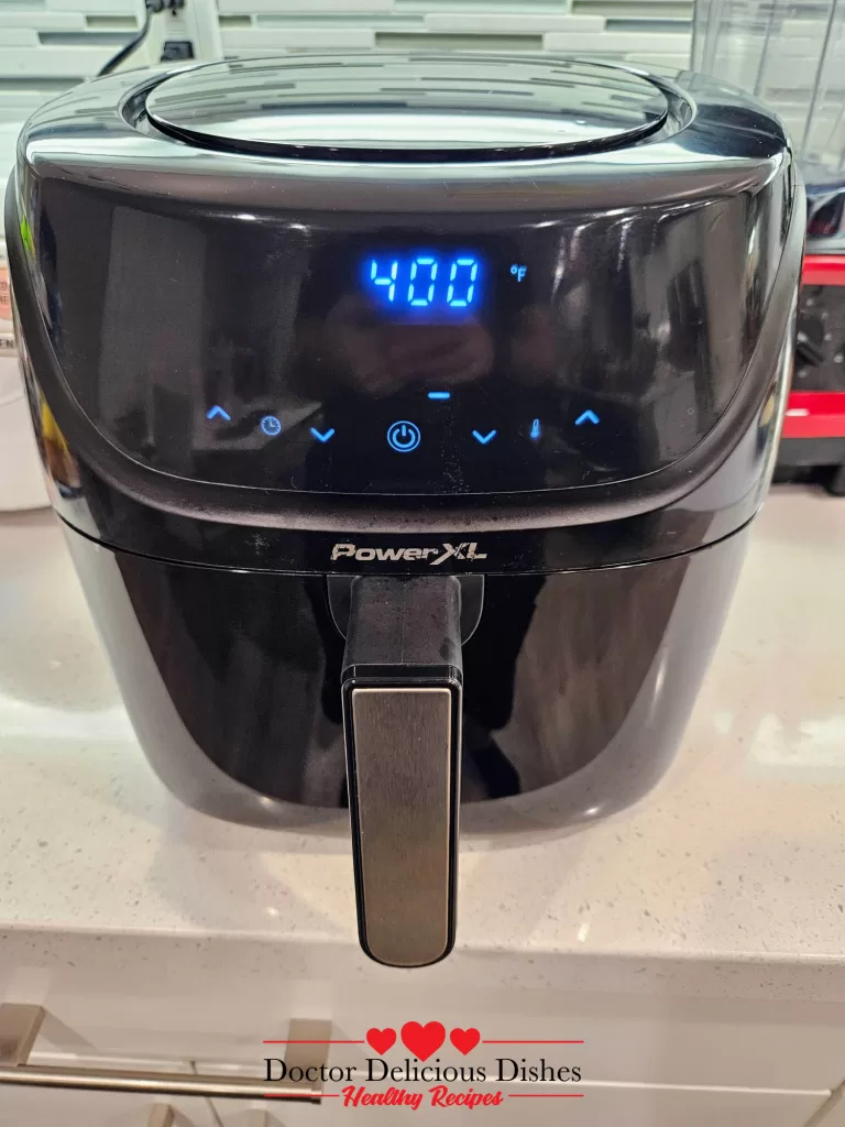 A PowerXL air fryer preheating to 400°F in preparation for cooking Crispy Air Fryer Chicken Tenders.