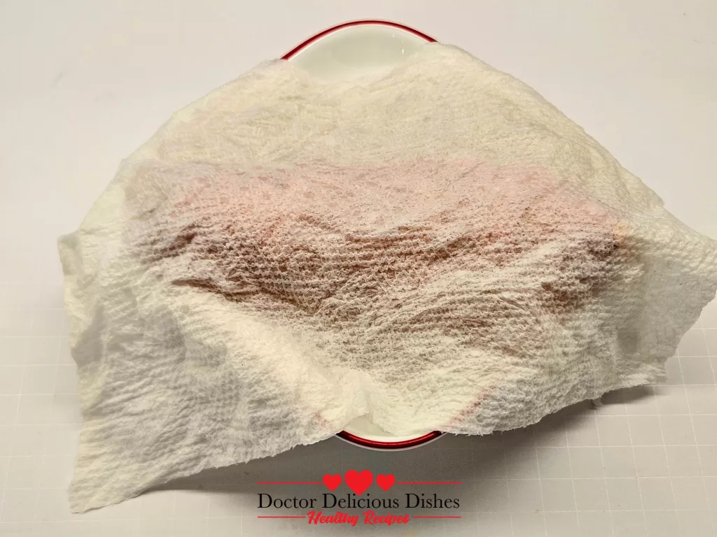 Sweet potato covered with a damp paper towel before going into the microwave