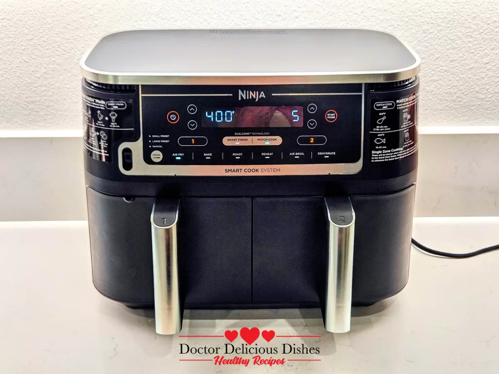 Ninja Dual Basket air fryer preheating to 400°F before cooking Air Fryer Chicken Thighs.