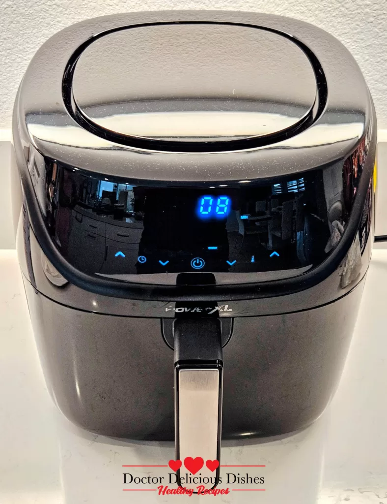 Air fryer timer set to 8 minutes while Teriyaki Salmon cooks.