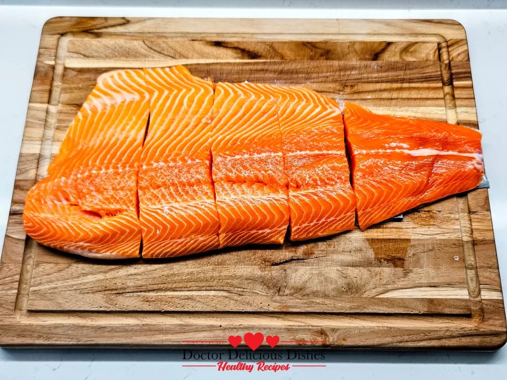 Salmon fillet sliced into portions for Air Fryer Salmon.