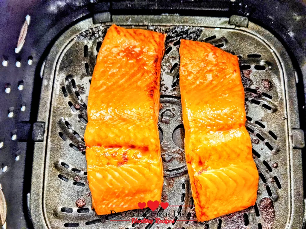 Crispy, caramelized Air Fryer Salmon fillets just cooked.