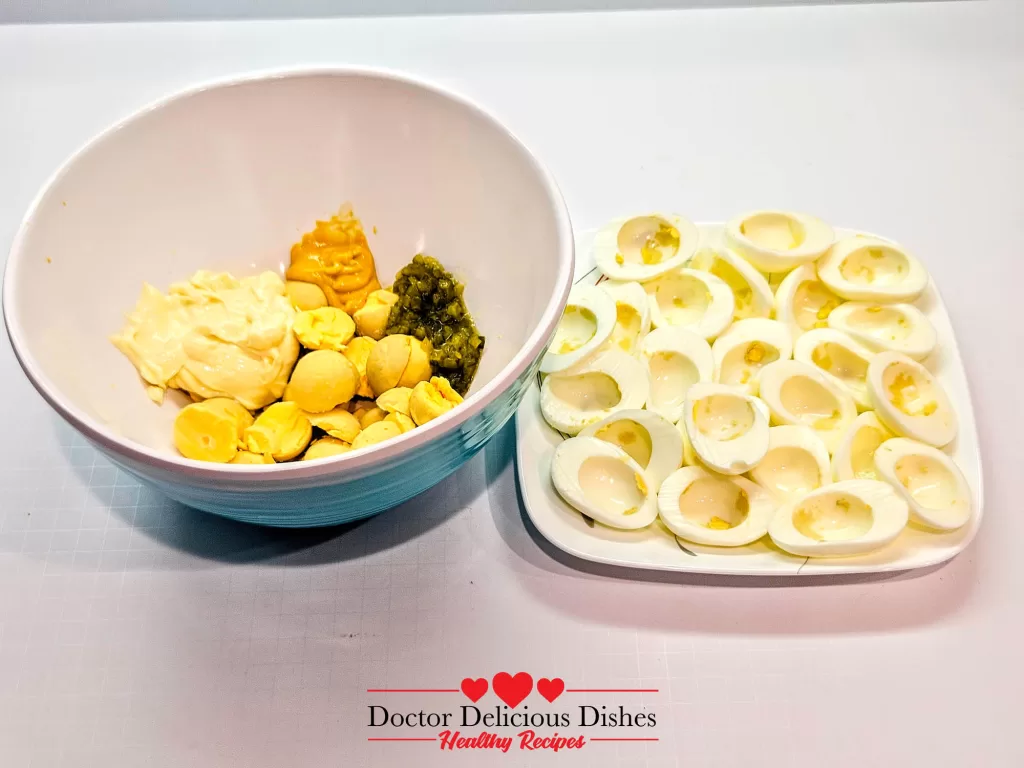 Deviled Eggs Recipe – egg yolks mixed with mayonnaise, mustard, and relish in a bowl