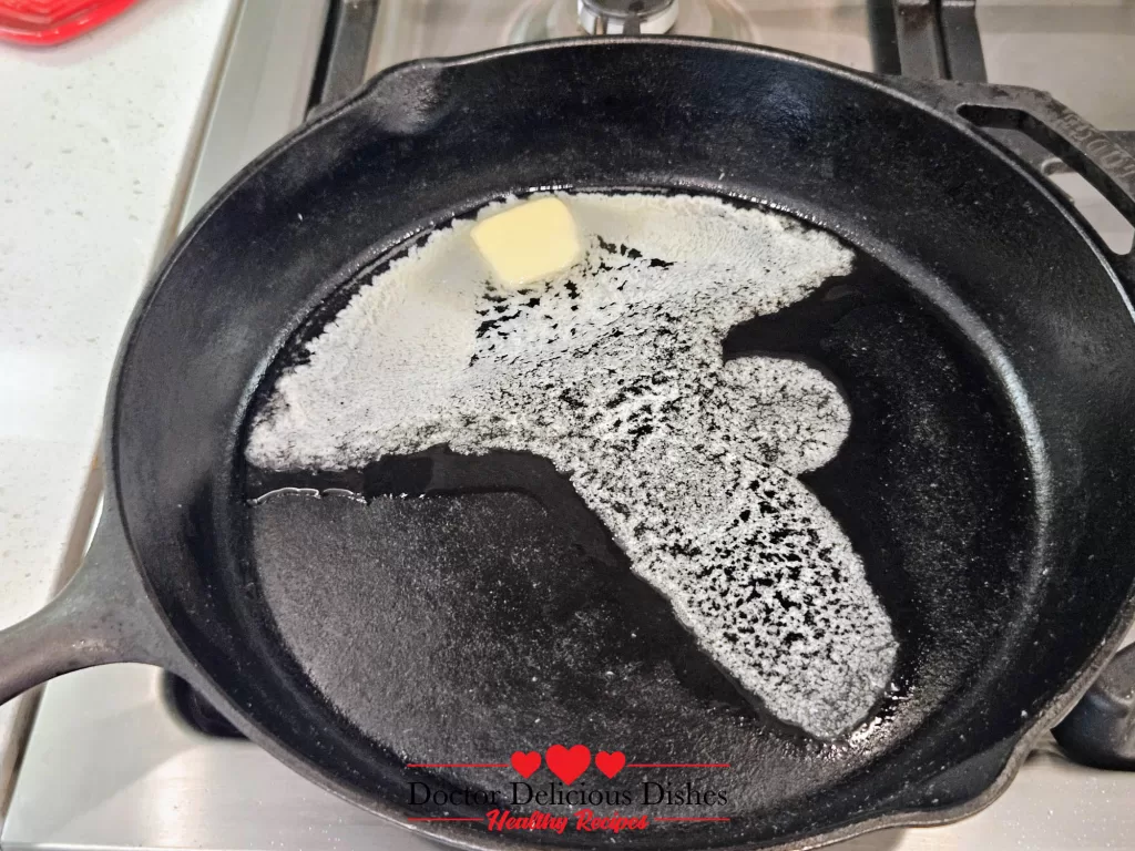 Melting butter in cast iron skillet for Southern cornbread recipe