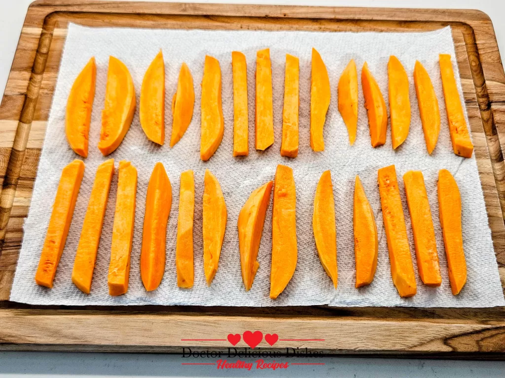 Sweet potato fries drying on paper towels to get crispy in the air fryer – Doctor Delicious Dishes