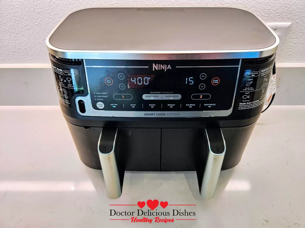 Ninja DZ550 air fryer set to 400°F for cooking sweet potato fries – Doctor Delicious Dishes