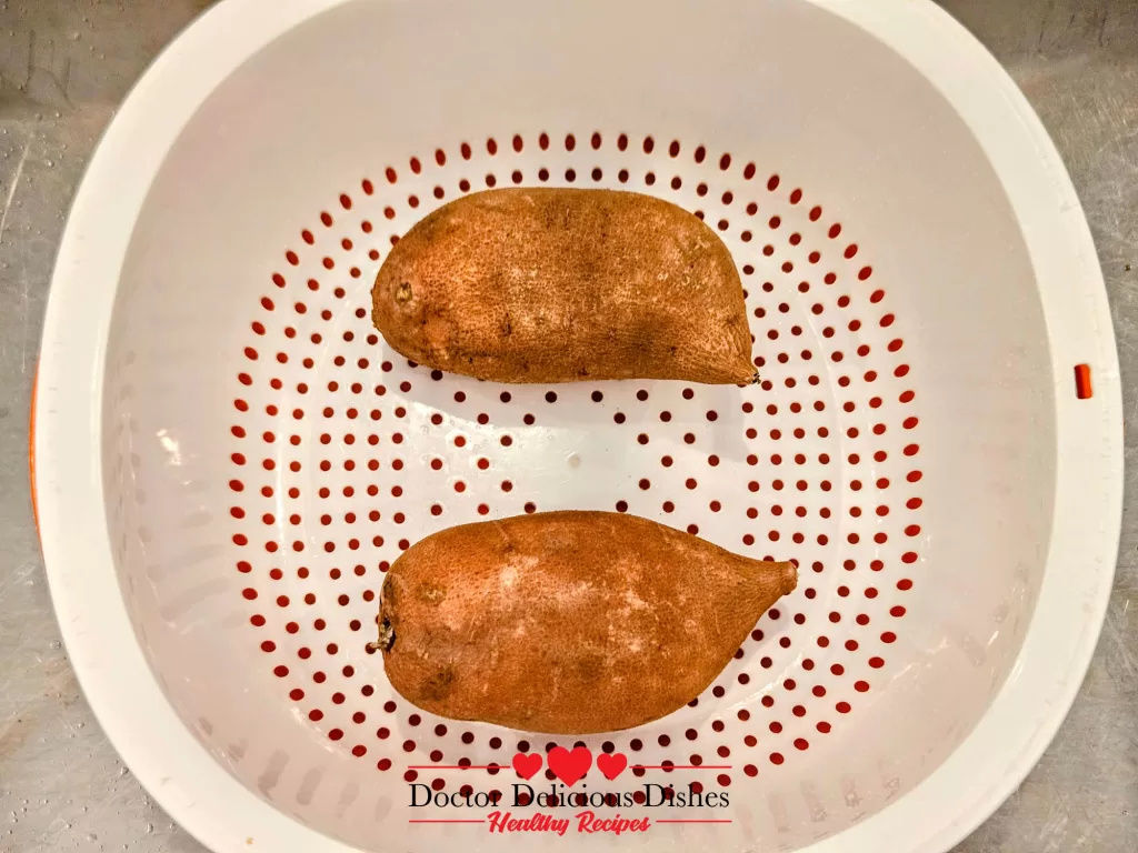 Sweet potatoes rinsed in colander for air fryer sweet potato fries – Doctor Delicious Dishes