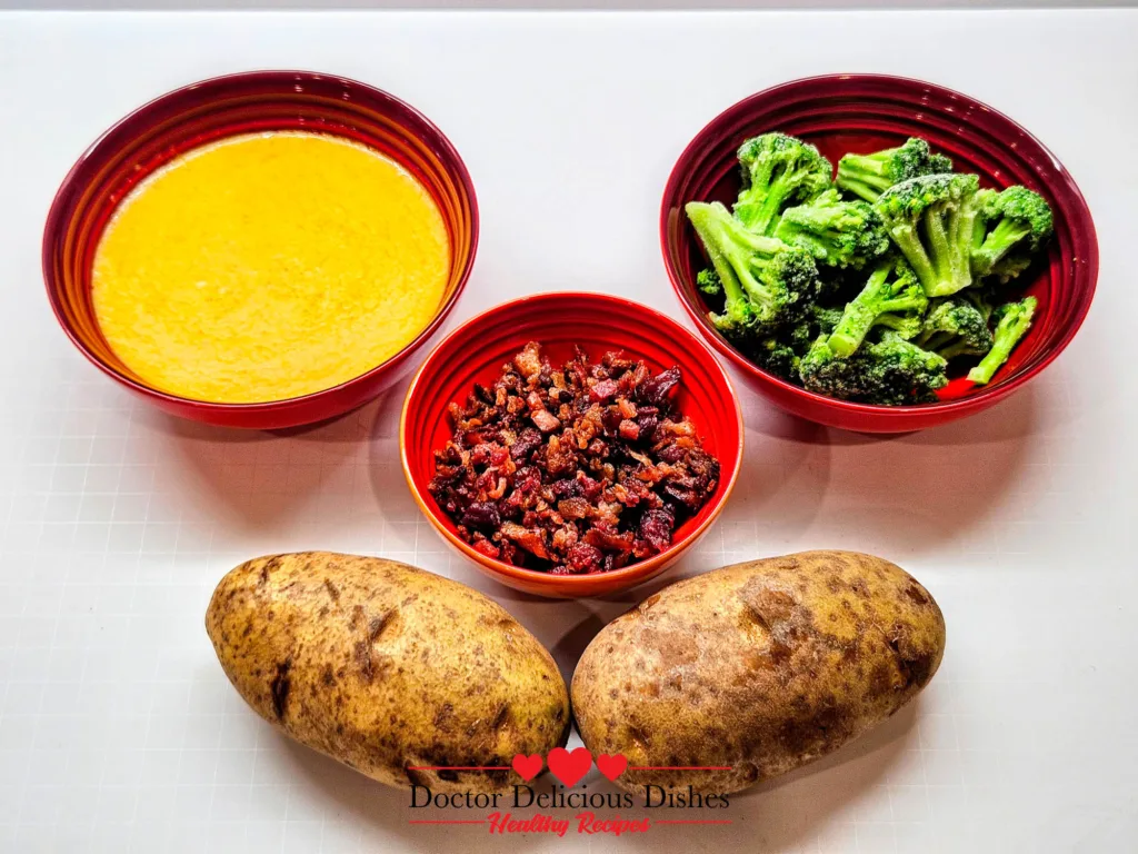 Ingredients for air fryer baked potato including nacho cheese sauce broccoli and bacon bits