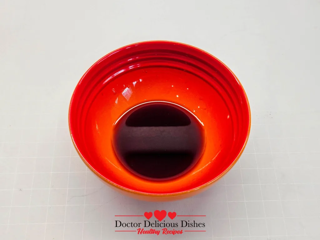 Shoyu dredge mixture for air fryer chicken katsu, made with soy sauce, water, and rice vinegar.