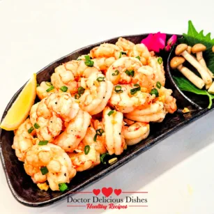 Angled view of Japanese-style Air Fryer Shrimp with garnish.