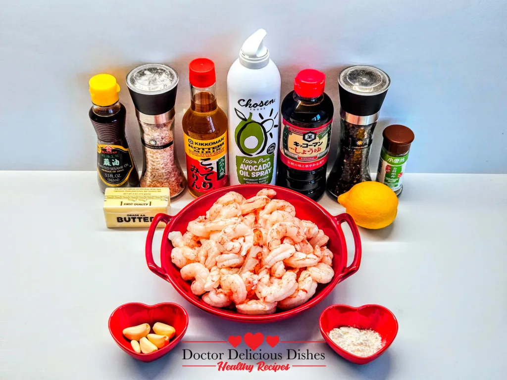 Garlic Butter Shrimp ingredients laid out with shrimp, soy sauce, butter, garlic, mirin, lemon, and seasonings.