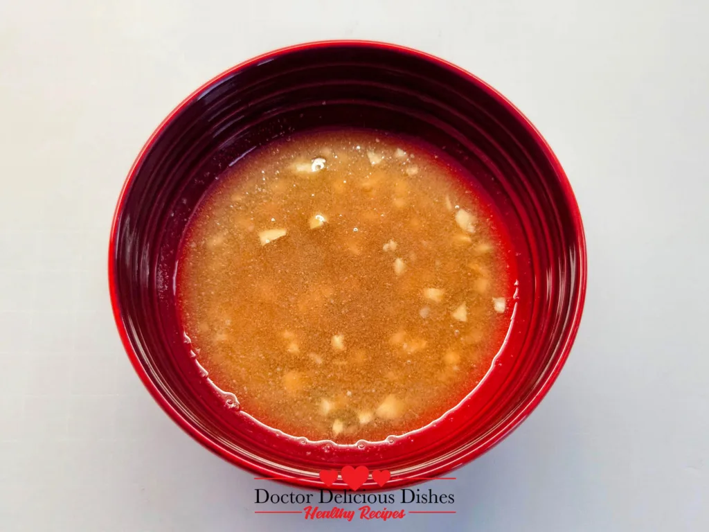 Garlic Butter Shrimp sauce made with melted butter, garlic, soy sauce, mirin, and lemon juice.