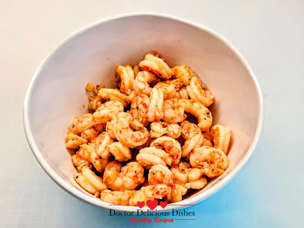 Garlic Butter Shrimp tossed with garlic–butter shoyu sauce after cooking.