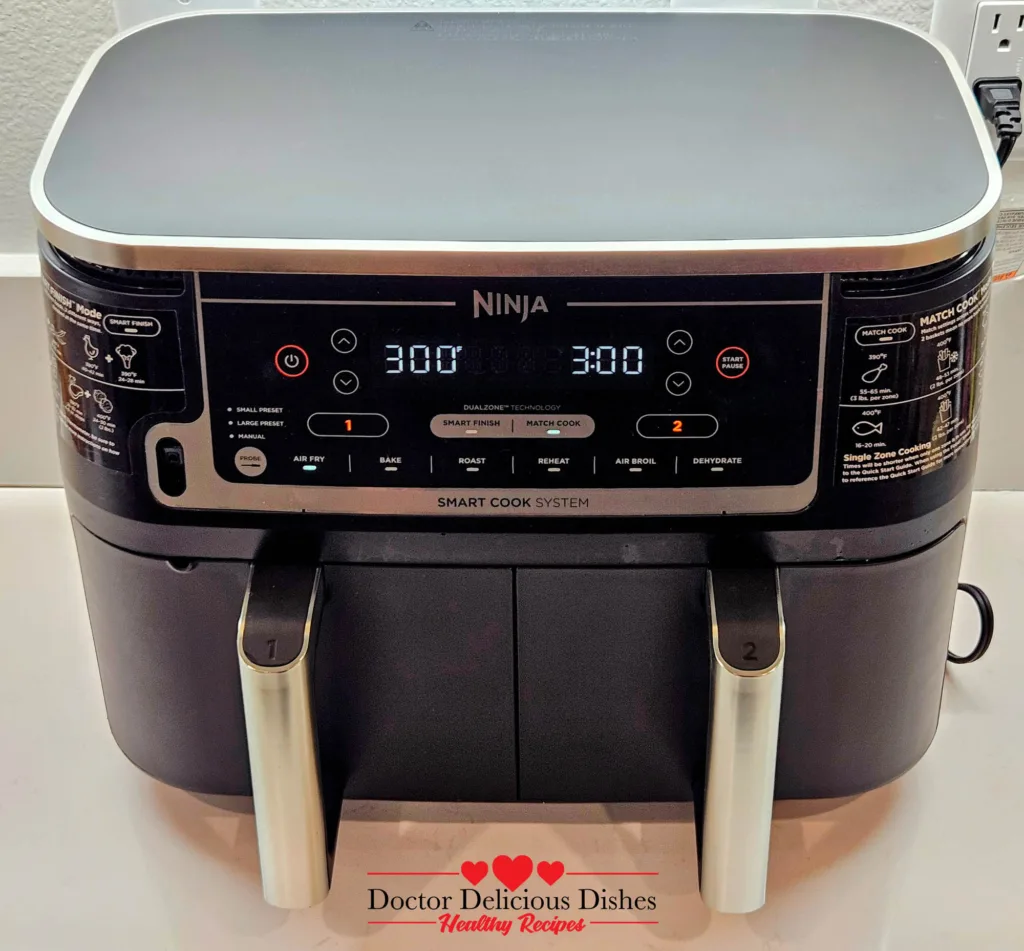 Ninja DZ550 dual-basket air fryer preheating to 300°F for castella cake