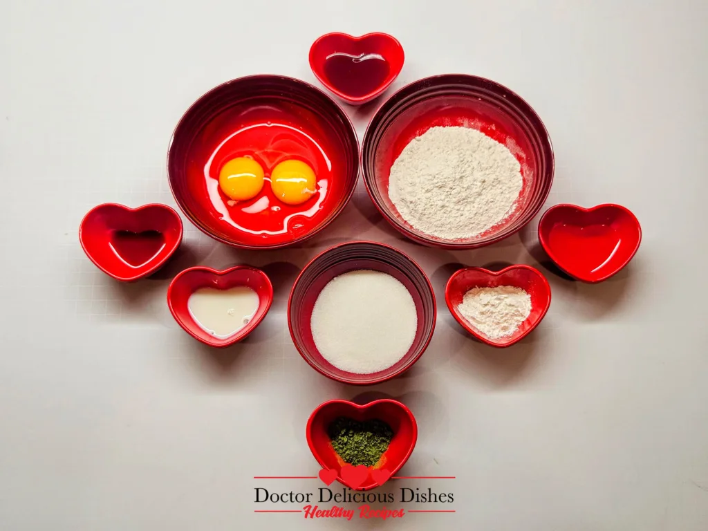 Top-down shot of Matcha Castella Cake ingredients arranged in heart bowls